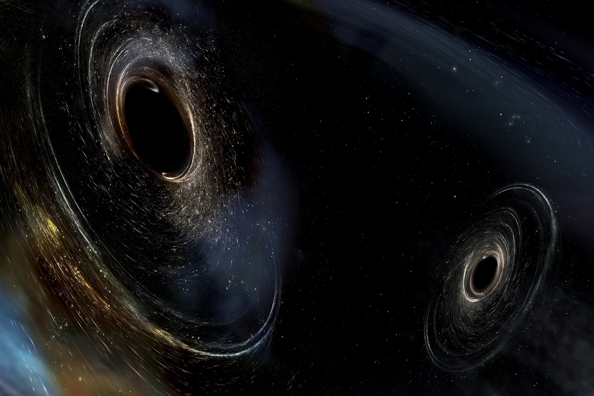 Astronomové získali první snímek dvou černých děr, které se společně otáčejí.